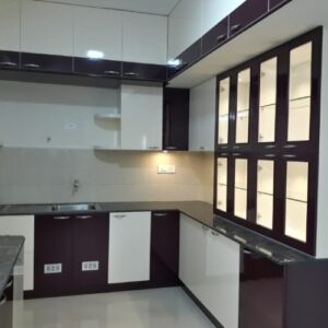 Elegant Dual-Tone Modular Kitchen with Glass Display Cabinets